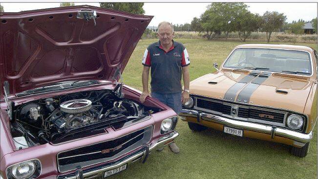 2008: Kevin Lehman with his two award-wining Monaros, the 1971 HQ GTS Coupe (left) and 1970 HT GTS, the best of its type in the country.