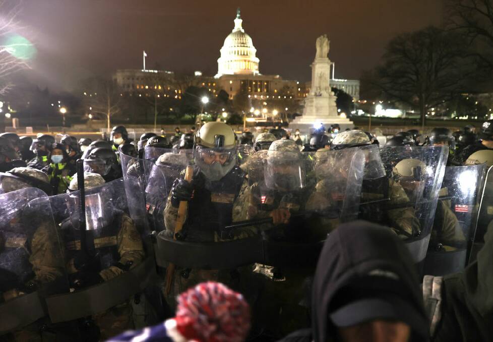 The National Guard protecting the Capitol Building after an afternoon of chaos in Washington DC. Photo: Getty