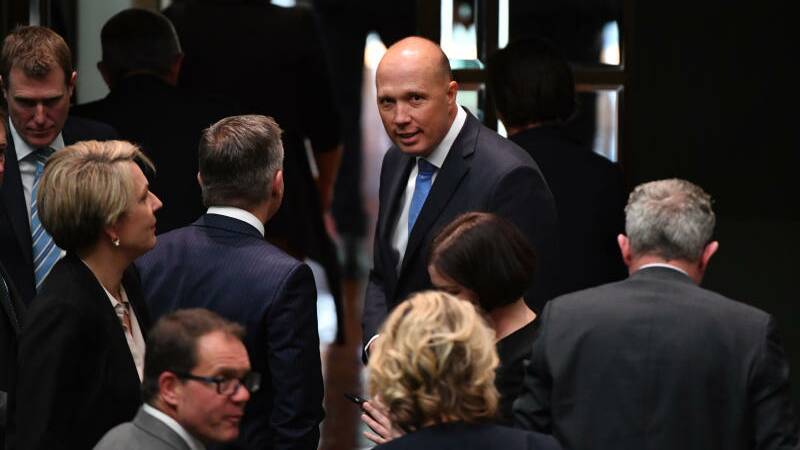 Former minister for Home Affairs Peter Dutton leaves after a division in the House of Representatives at Parliament House in Canberra on Wednesday. Photo: AAP Image/Mick Tsikas