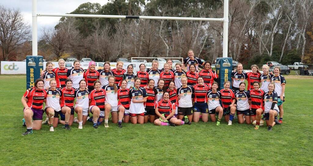 RUGBY CELEBRATION: Southern Inland's City and Country teams after their clash in Canberra on Saturday.