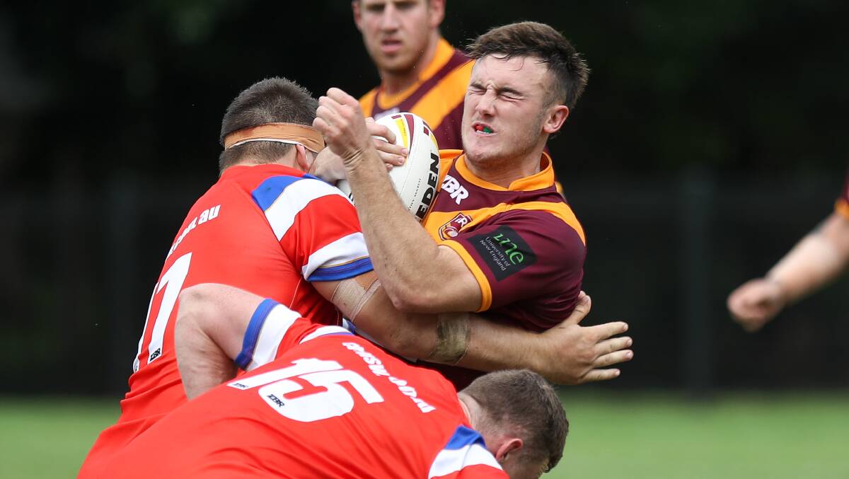 BRINGING THE PAIN: Albury forward Liam Wiscombe feels the brunt of a tackle by Illawarra in Riverina's 52-10 loss in the Country Championships on Saturday. Picture: The Illawarra Mercury