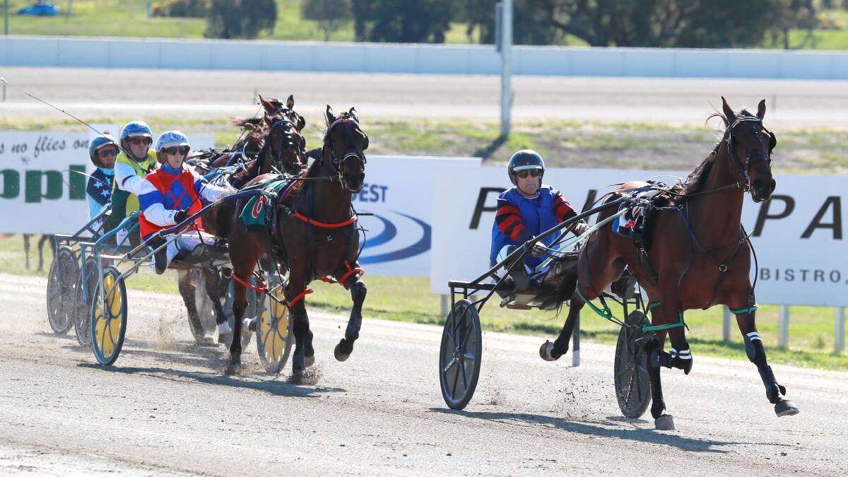 BREAKTHROUGH: John Scott guides Braedos Lad to success at Riverina Paceway on Friday. It was the two-year-old's first win at start four. Picture: Les Smith