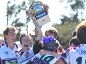 Leeton celebrate their under 17s grand final victory in 2013. It was the last time an underage competition was held but there plans to introduce an under 18s competition this year.