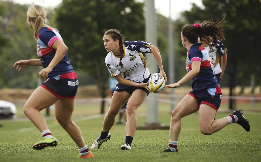 SLICK HANDS: CSU's Claudia Obst looks to move the ball playing for ACT in the national rugby sevens championships on Sunday. Picture: Rugby Australia/Karen Watson