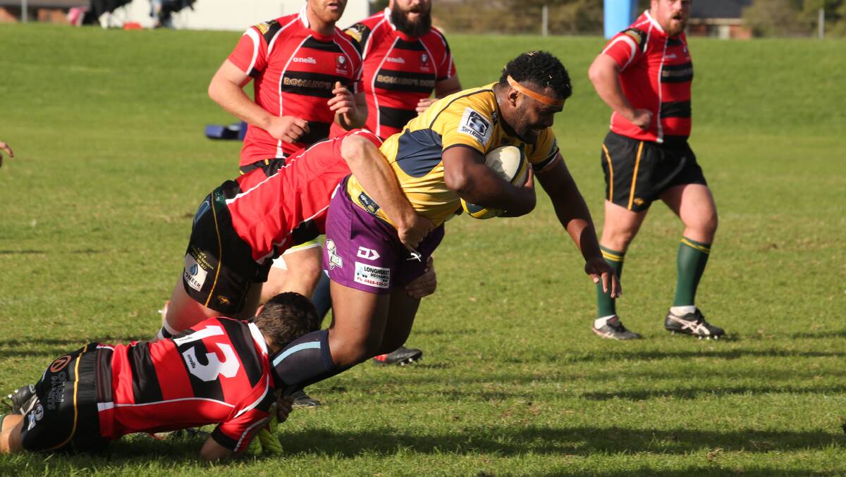 GOING DOWN: Country prop Sai Ratudradra is caught by the City defence in the Southern Inland rep game on Sunday. Picture: Anthony Stipo