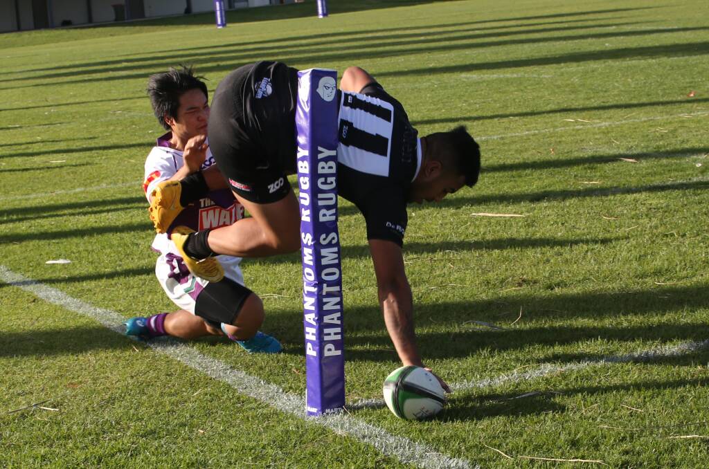 QUALITY FINISH: Kit Toia slams the ball down right in the corner in Griffith's loss to Leeton. He scored a hat-trick as the Phantoms scored a 45-31 win on Saturday. Picture: Anthony Stipo