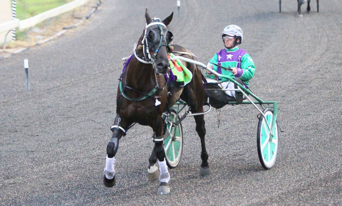 WINNING RETURN: Beau Cishlom returned after more than 12 months away from racing to win at Wagga on Tuesday. It was also reinsman Reece Maguire's 100th career victory. Picture: Courtney Rees