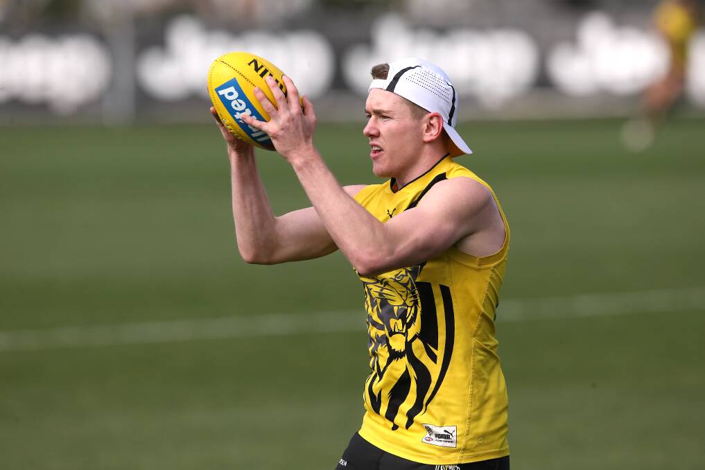 LIVING THE DREAM: Jacob Townsend at Richmond training. Weeks after wondering about his AFL future, the Leeton product will line up in the grand final. Picture: AAP