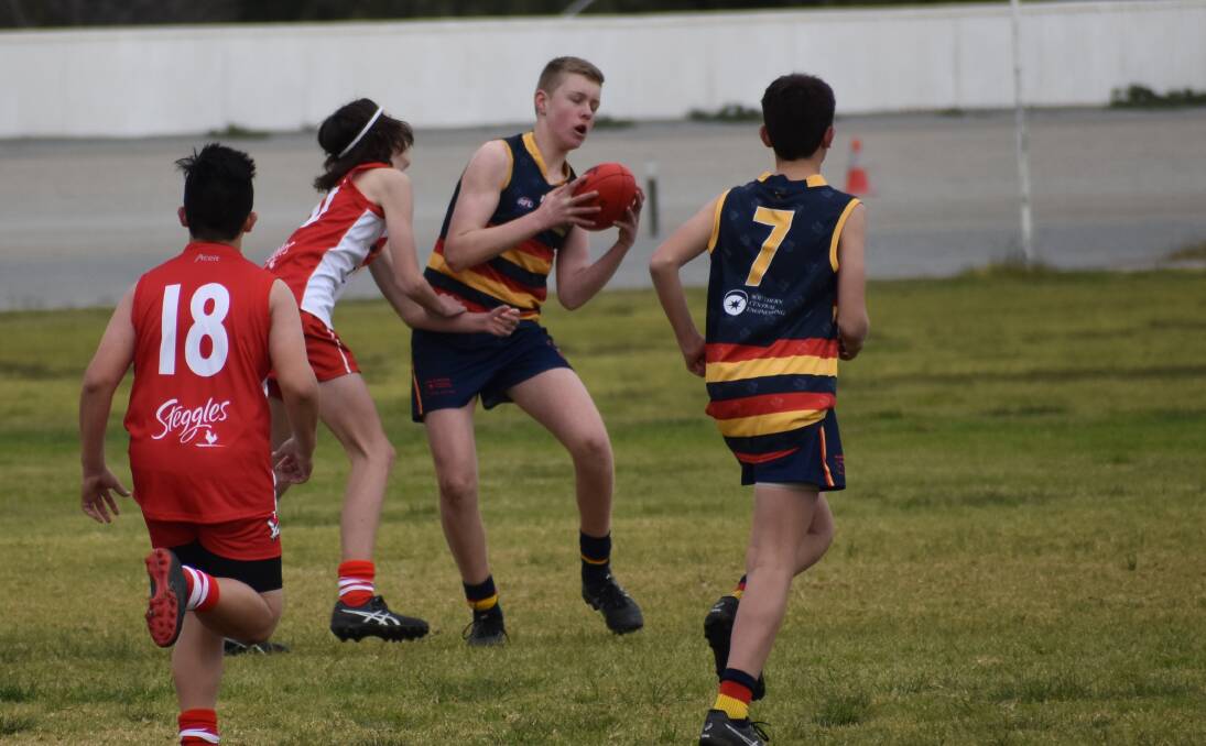 Logan Mahalm kicked two goals in the Crows draw in under 15s