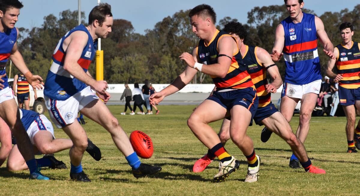 CHASING THE BALL: Coopa Steele looks to gain possession during the Crows clash with Turvey Park. PHOTO: Liam Warren