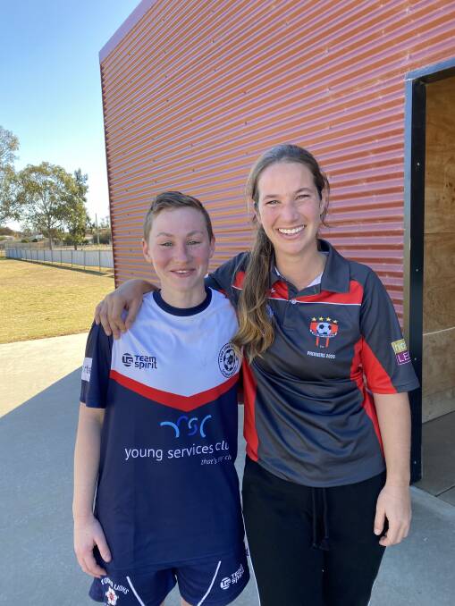 FAIRWELL: Leeton United's Paula Bocca with Young's Laura Atkins after playing her final game for United on Sunday. PHOTO: Megan West