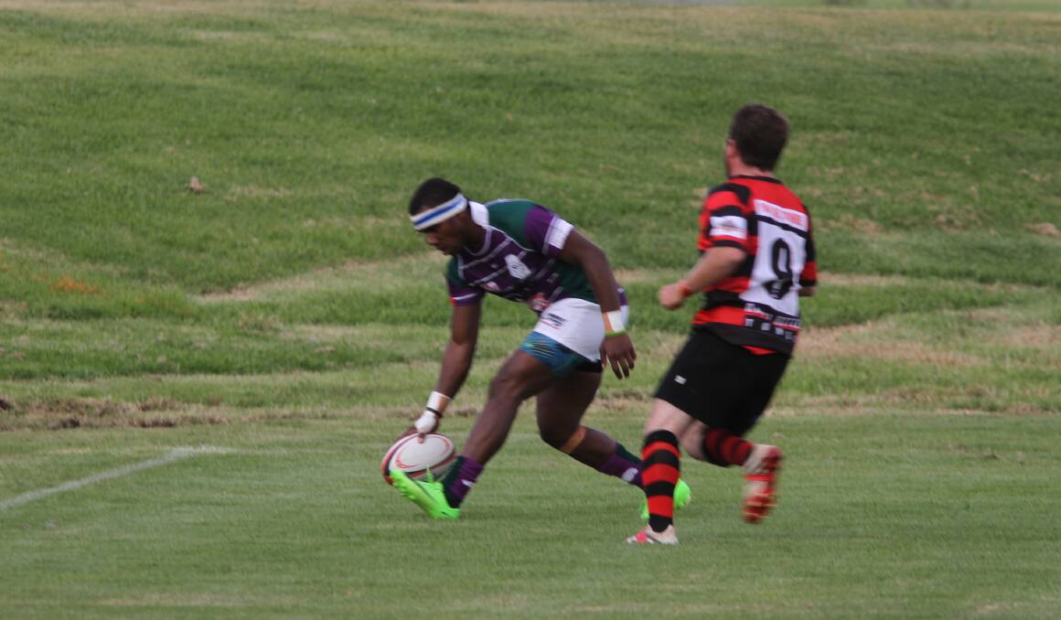 TRY TIME: Petero Taitusi scores one of the five tries for the Phantoms in their 36-10 round one win over Tumut before the Easter break.