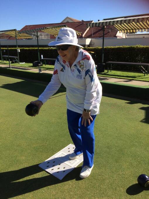 BOWLED OVER: Lee Noble prepares to put down a winning shot during her game for LSC. Picture: Contributed 