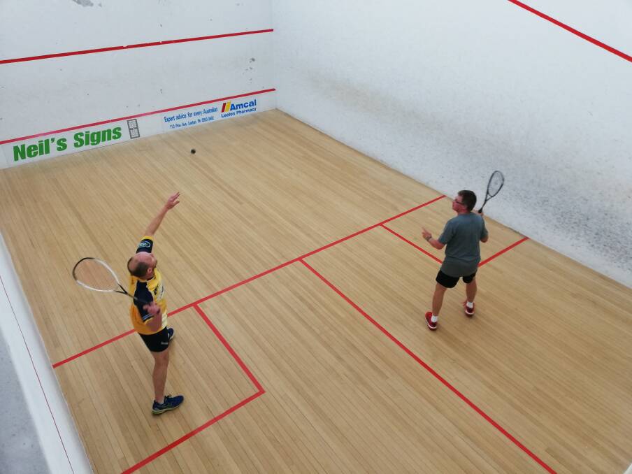 UPSET: Tim Allen (left) with Fred Hammer in the squash match of the week. Hammer played an impressive match, delivering Allen his first loss of the season. Picture: Contributed