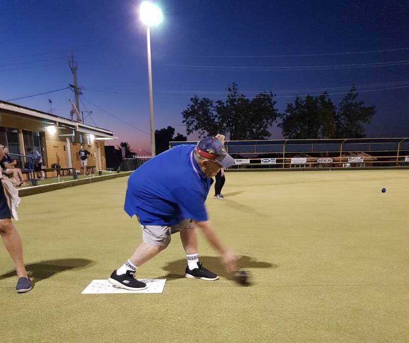 ACTION STATIONS: Tommy Thompson puts a bowl down at the Barefoot Bowls Bash on Tuesday night at L&D Club. Picture: Contributed