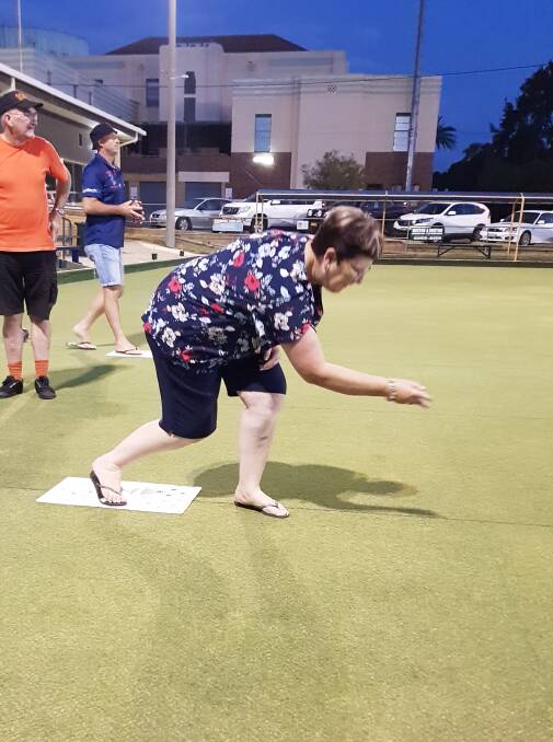 WHOLE LOT OF FUN: Margaret Looby representing the L&D (white) side at the Barefoot Bowls Bash. 