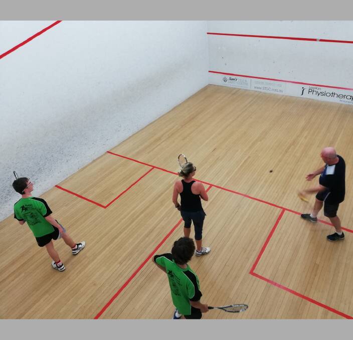 CHALLENGE: Doubles squash finalists (winners in black Gary Thompson and Marcelle Steele and runner ups in green with Callum Ryan waiting to receive and Will Rawle backing up). Grand final results to be printed Friday. 