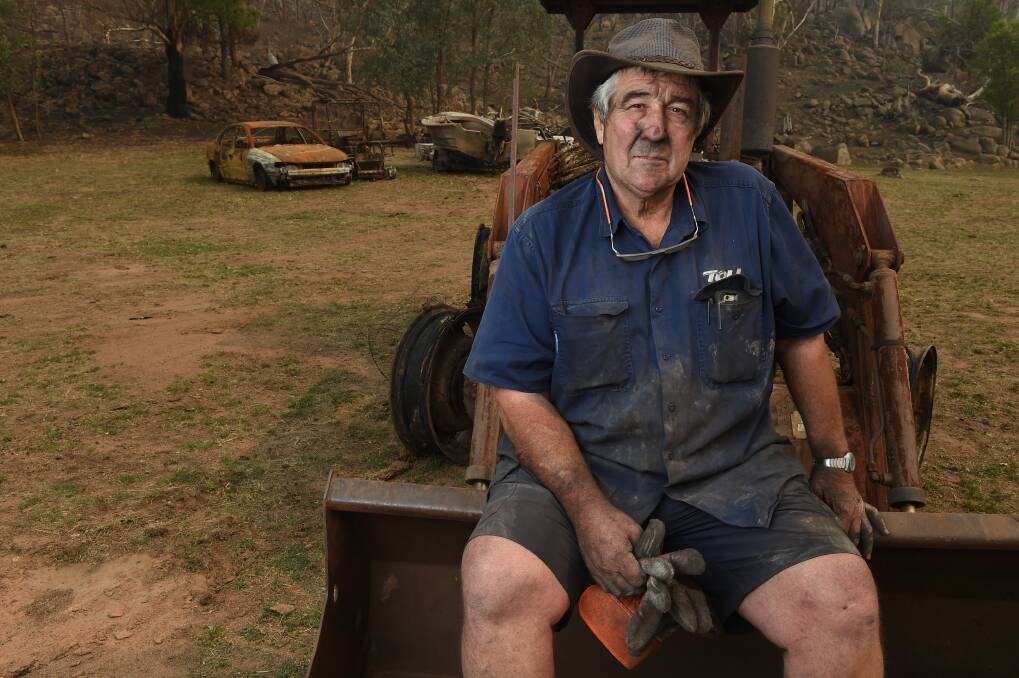 Grateful: Ron Barker with items hit by fire at his Tintaldra shed in early January. Picture: MARK JESSER