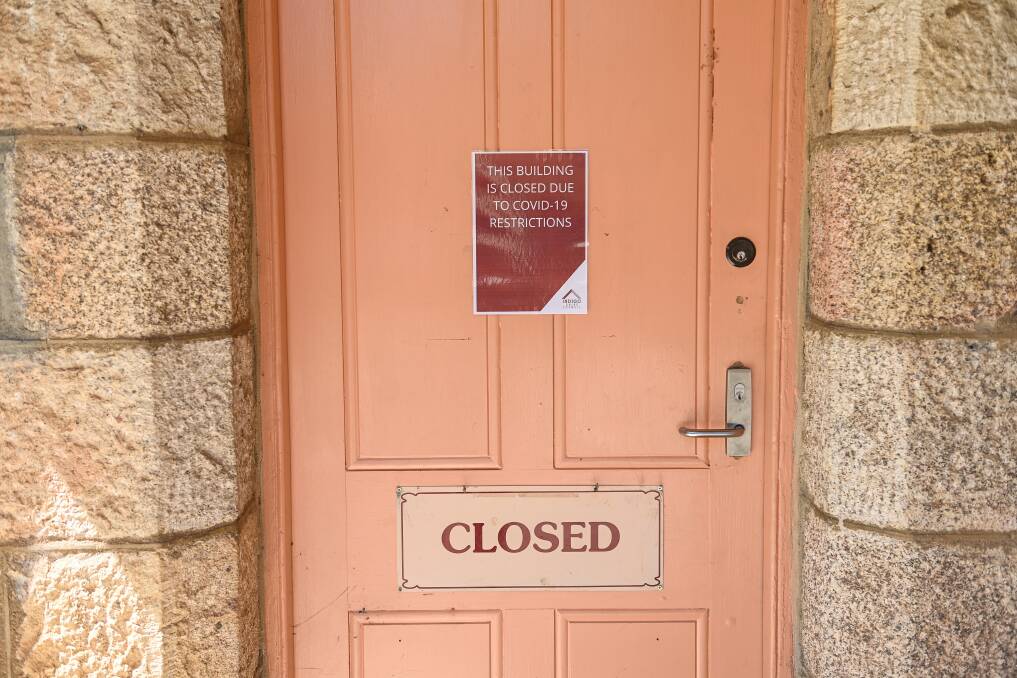 Writing on the door: The entrance to the sub-treasury building which houses the Ned Kelly Vault has been closed since March and the attraction will not re-open. Picture: MARK JESSER