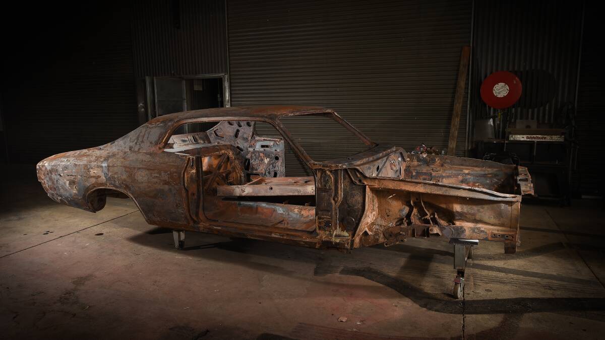 Skeletal: The remains of the Valiant Regal VJ hardtop owned by Ron Barker which will be restored thanks to the initiative of Dave Cooper. Picture: MARK JESSER