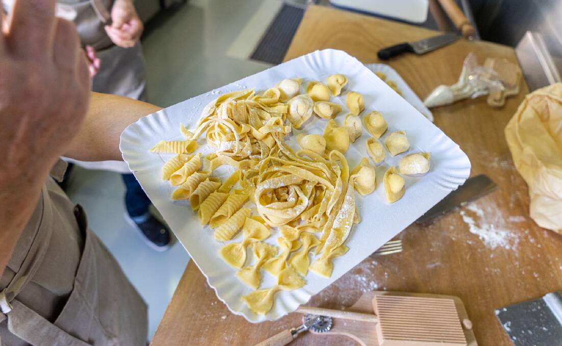 Making pasta at a cooking class in Emilia-Romagna, Italy.
