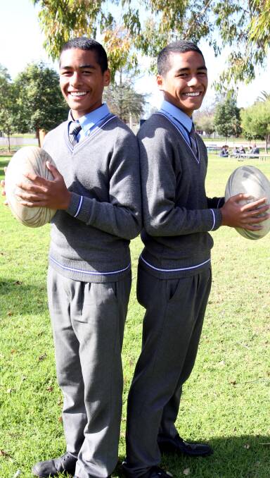 SKILL: St Francis College students Max (left) and Matt Feagai are representing at the country and state levels respectively in the Catholic schools rugby league system.
