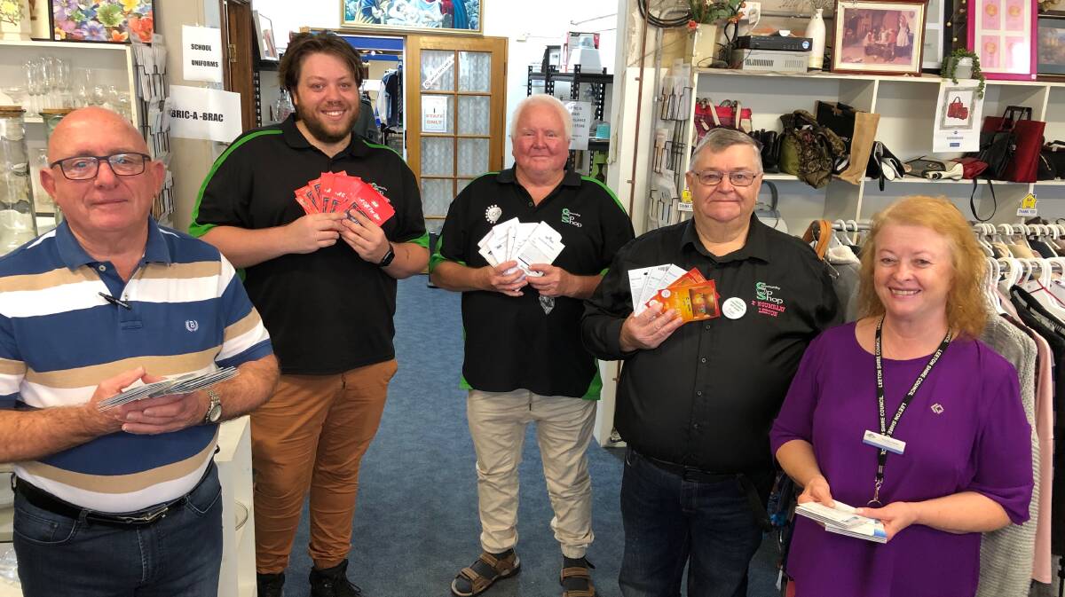 THANKS: Priscilla Hester from the Uniting Church (right) with Brian Troy (Vinnies) and Brady Smith, Geoffrey Bull and Tom Thompson (op shop).