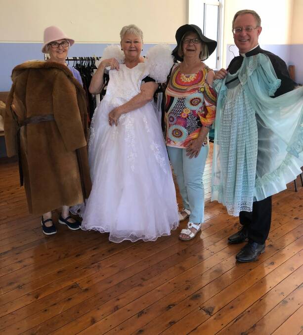 MODELS:  Phyllis Guthrie, Lorraine Mudge, Alma Herrmann and Father Robert Murphy show some off some of the looks. Photo: Talia Pattison 
