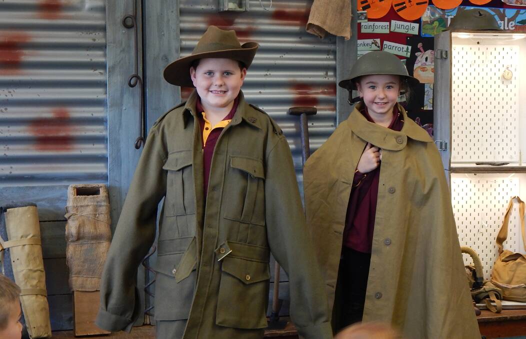 EXPERIENCING HISTORY: Wamoon Public School students Alex DeCrescenzo (left) and Alexis Granger during the recent visit. Photo: Contributed 