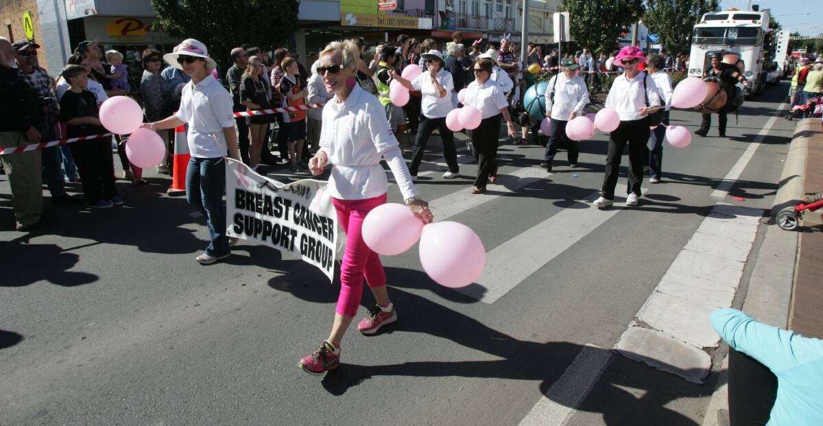 BRIGHT: The Leeton Breast Cancer Support Group proudly takes part in the 2014 Leeton SunRice Festival street parade. 