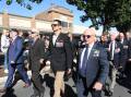 Leeton shire veterans make their way down Pine Avenue during the main march and commemoration service during Anzac Day. Picture by Talia Pattison