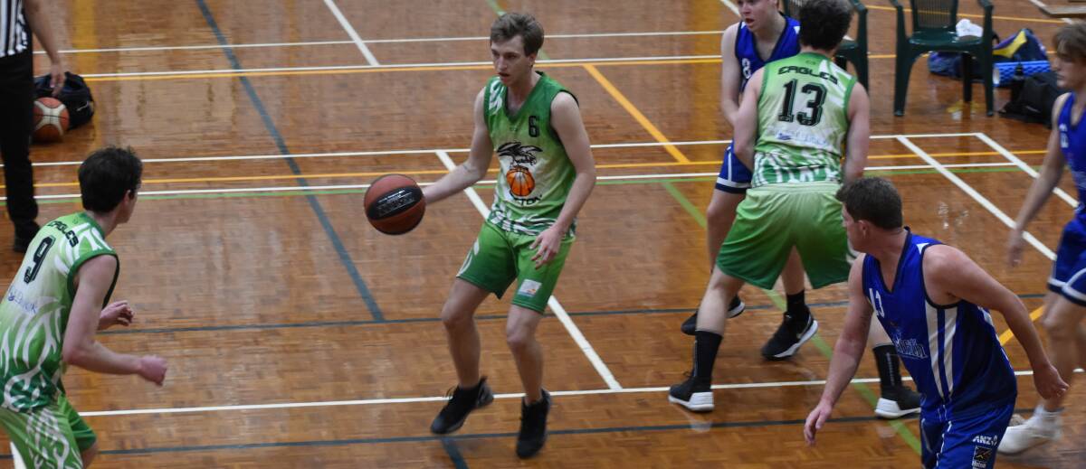 SEARCHING: Leeton's Seth Pearse looks for options during his team's recent match up with the Griffith Demons. Photo: Shaun Paterson 