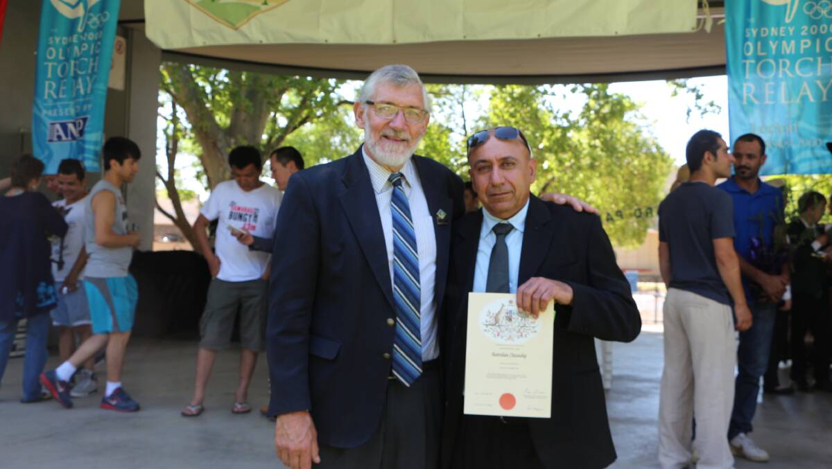 Abdol Samad Sorkheh with mayor Paul Maytom after his naturalisation ceremony on Australia Day in Leeton. 