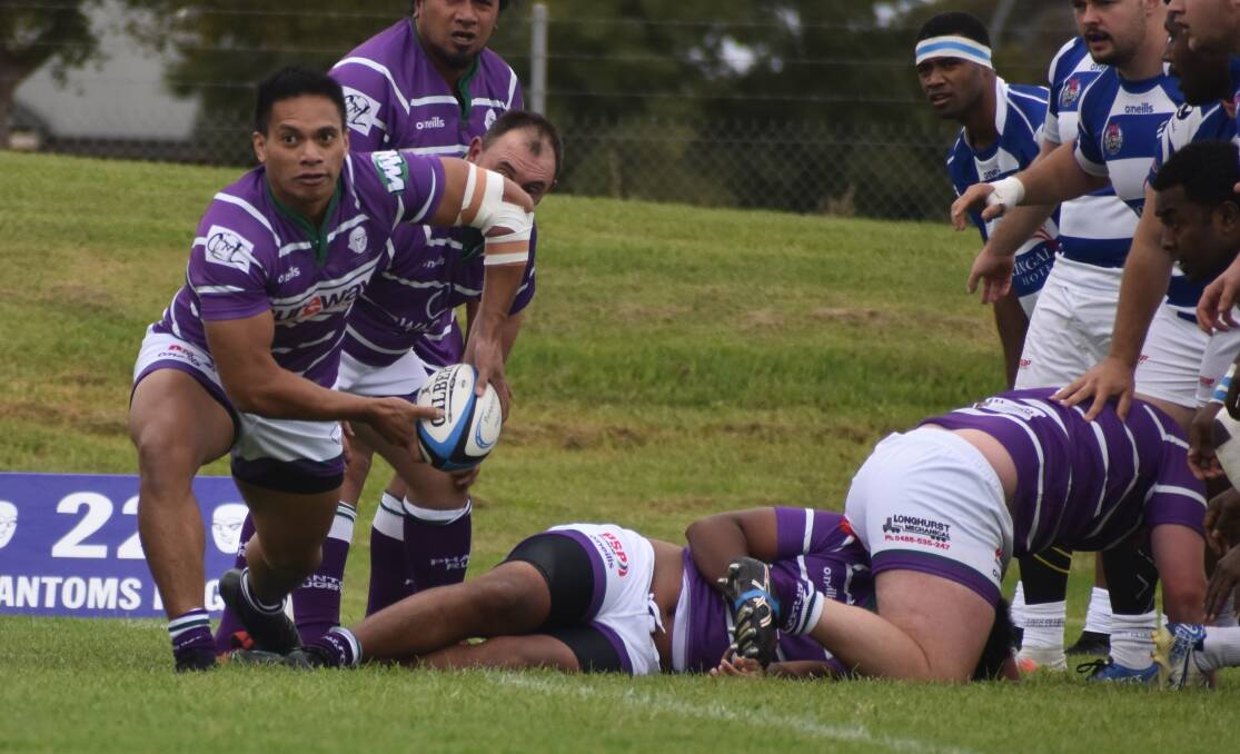 SEASON DONE: Paul Ta'avao prepares to offload the ball during one of Leeton's third grade matches this year. Photo: Liam Warren 