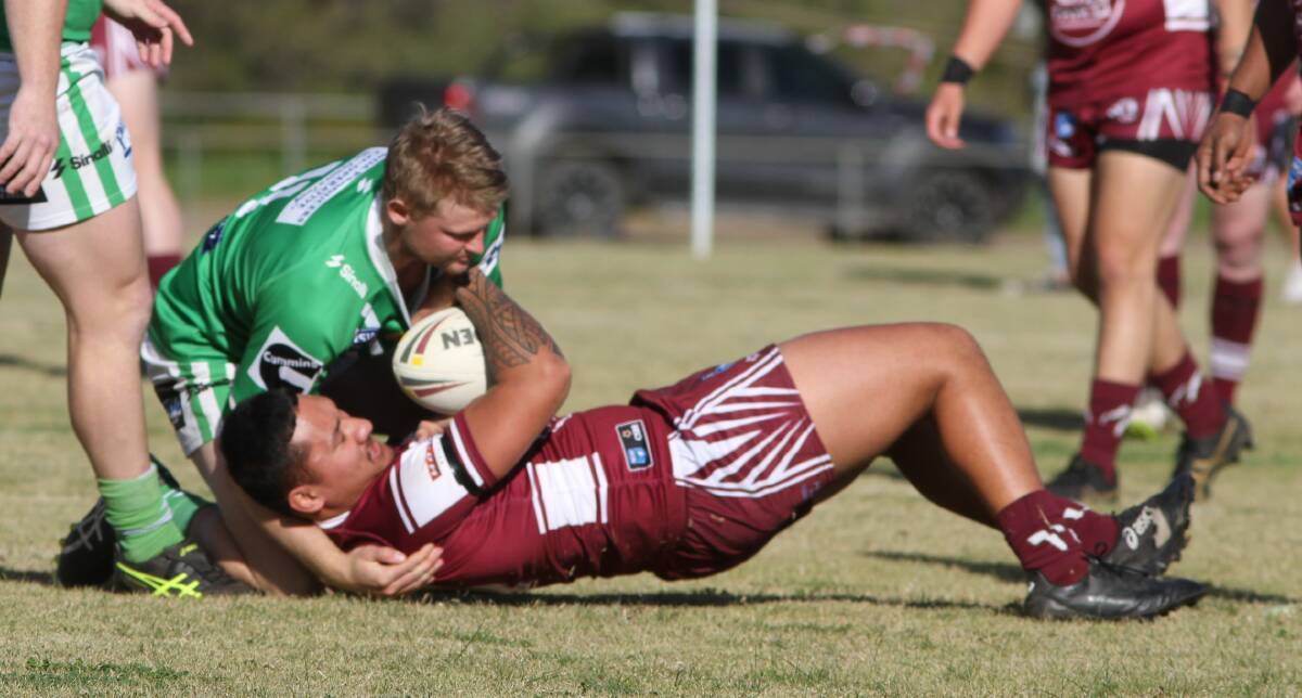 POSSESSION: Yanco-Wamoon's Talalelei Faoa is brought to ground during last weekend's derby clash with the Greens. Photo: Talia Pattison 