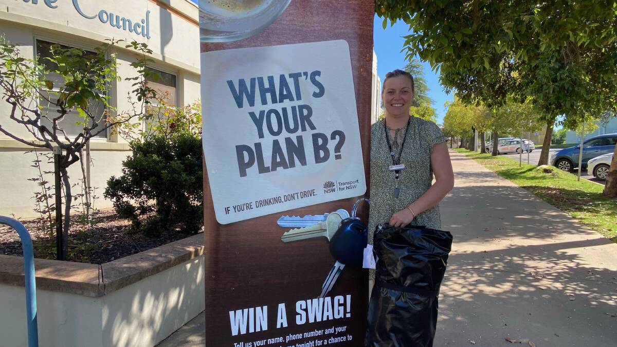 STAY SAFE: Leeton Shire Council's road safety officer Steph Puntoriero with the swag that's on offer as part of the campaign. Photo: Talia Pattison