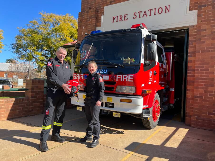 CHANGING OF THE GUARD: Long-serving Leeton Fire and Rescue NSW Captain Graham Parks welcomes Emma Tyrrell to the role. Emma is the first female fire captain in Leeton. Photo: Talia Pattison