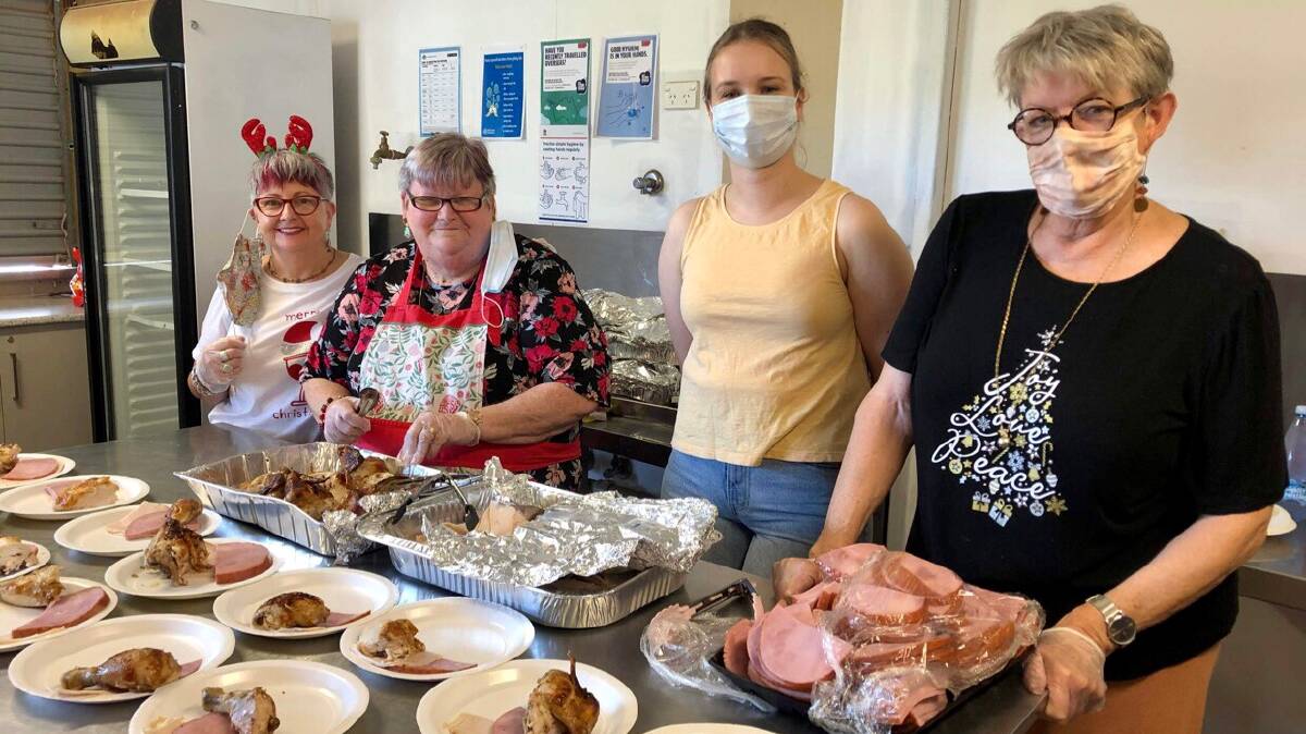 SANTA'S HELPERS: The Leeton Community Christmas Lunch was again a huge hit on Christmas Day 2021. Photo: Supplied