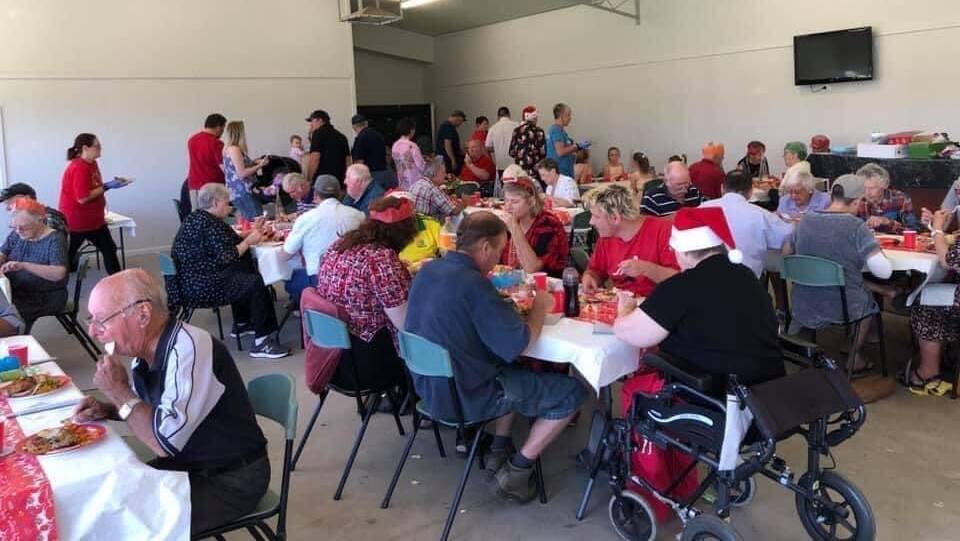 ALL TOGETHER: Last year's Community Christmas Lunch was a special one. Photo: Supplied