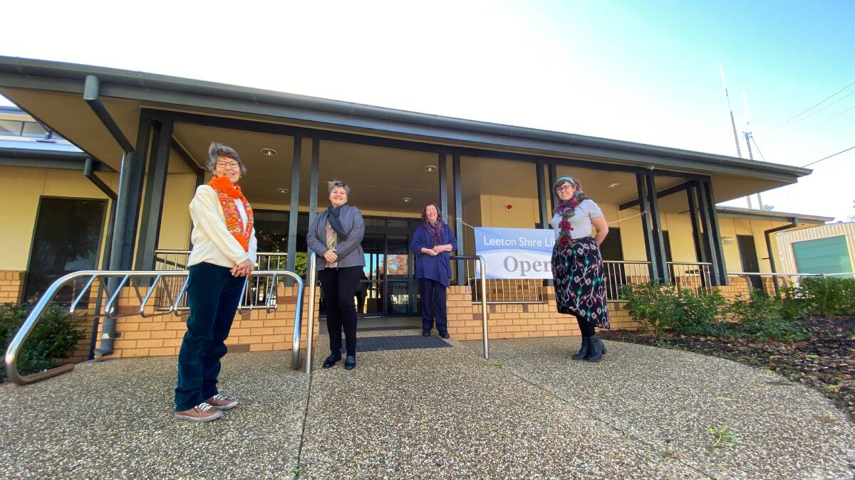 DOORS OPEN: Leeton library staff Susie Rowe, Rachel Cody, manager Terry O'Keefe and Zoey Lucas on Tuesday morning. Photo: Talia Pattison