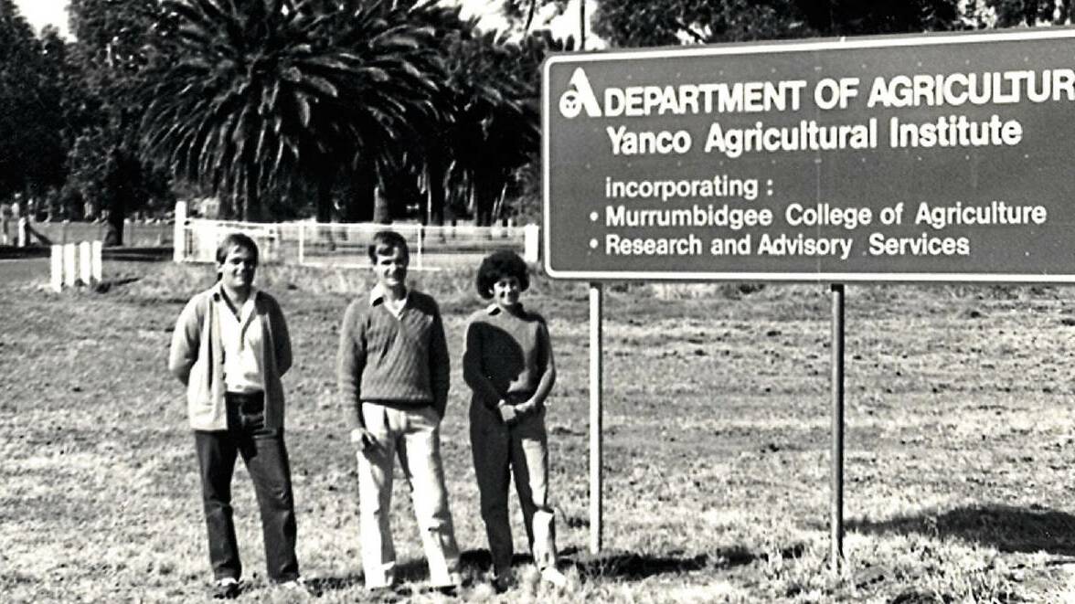 FLASHBACK: Department of Agriculture researchers Phil Sinclair, Bruce Logan and Rita Hermus stand at the entrance of the Yanco Agricultural Institute in the early 1980s. Photo: Supplied