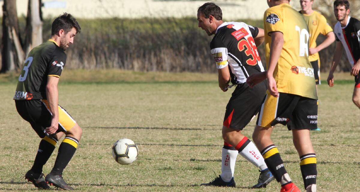 VITAL WIN: Leeton United's Michael DiLorenzo aims to get the ball under control during a recent game. United defeated South Wagga 5-1 on Sunday. Photo: Talia Pattison 