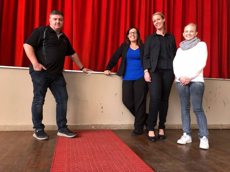 ROLL OUT: Preparing the red carpet for Saturday night's Leeton Business Awards is Wayne Bond, Jodie Ryan, Alison Egan and Renee Sloan. Photo: Talia Pattison