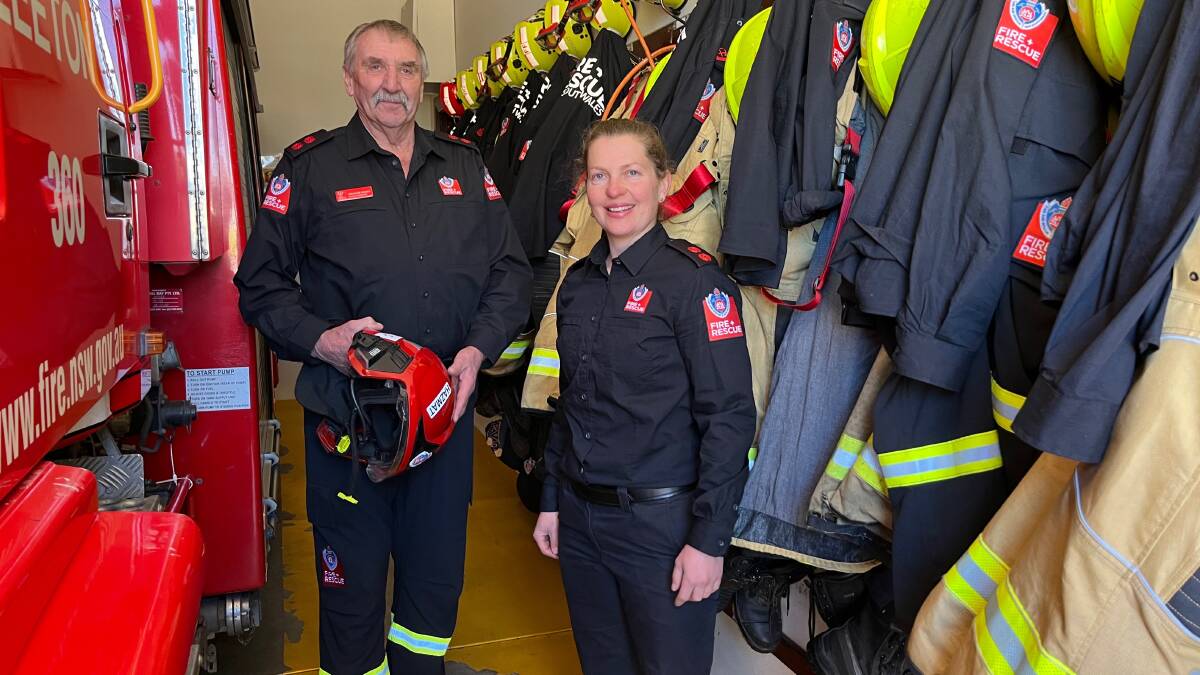 BOOTS TO FILL: Graham Parks (left) with new Leeton Fire and Rescue Captain Emma Tyrrell. Photo: Talia Pattison