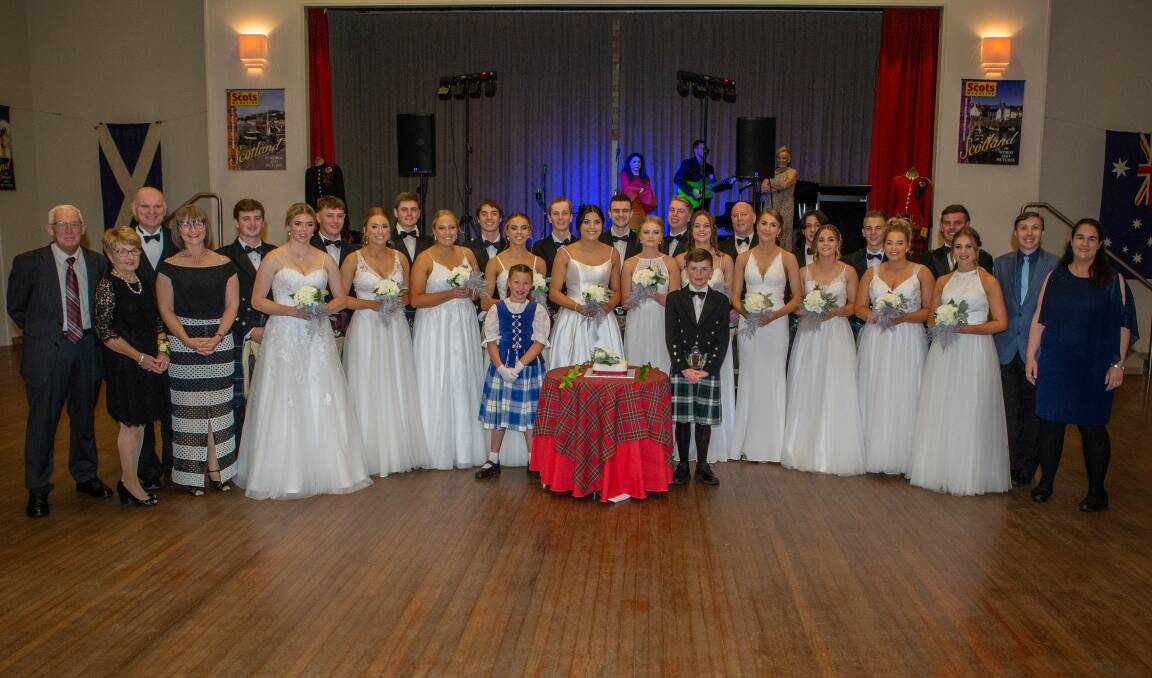 ON AGAIN: Last year's debutantes, their partners and special guests at the Scottish Ball. Photo: Supplied