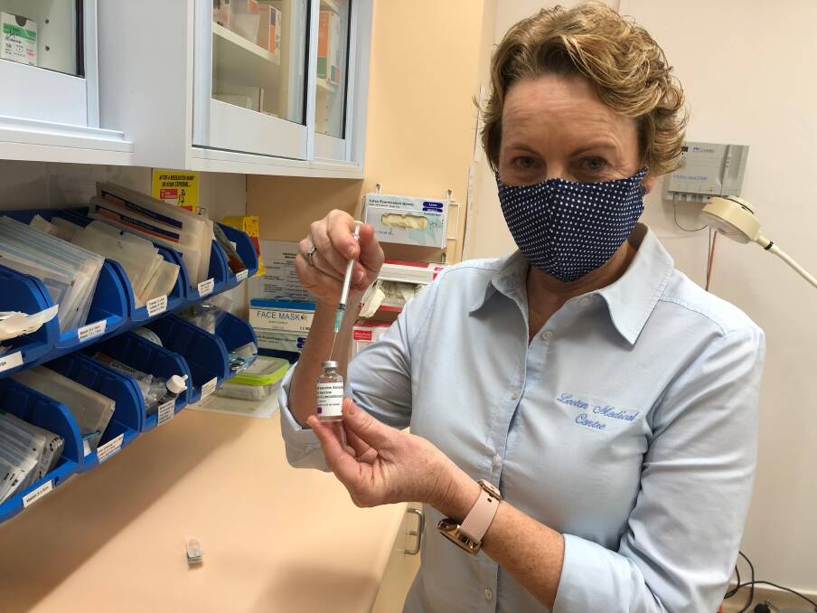 BE INFORMED: Registered nurse at the Leeton Medical Centre Christine Wallace with the AstraZeneca vaccine. Photo: Talia Pattison
