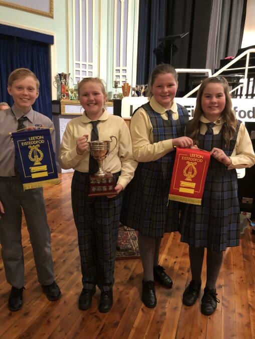 GREAT WORK: Tom Cooper, Brooke Pearce, Mackenzie OLoughlin, Phoebe Naylor celebrating success in the choral section. Photo: Contributed
