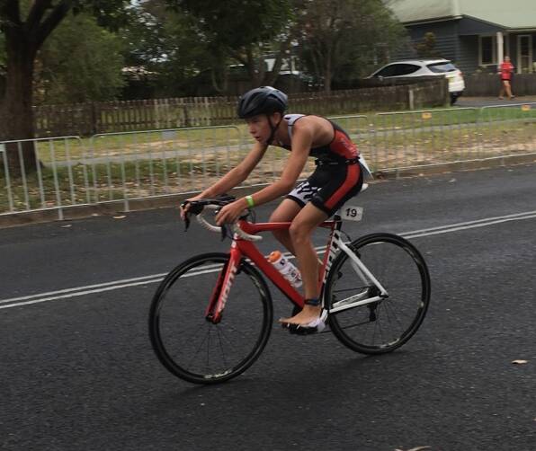 HARD AT IT: Leeton's Max Norman in action during the recent triathlon at The Rock. Max finished fourth at the event. Photo: Contributed