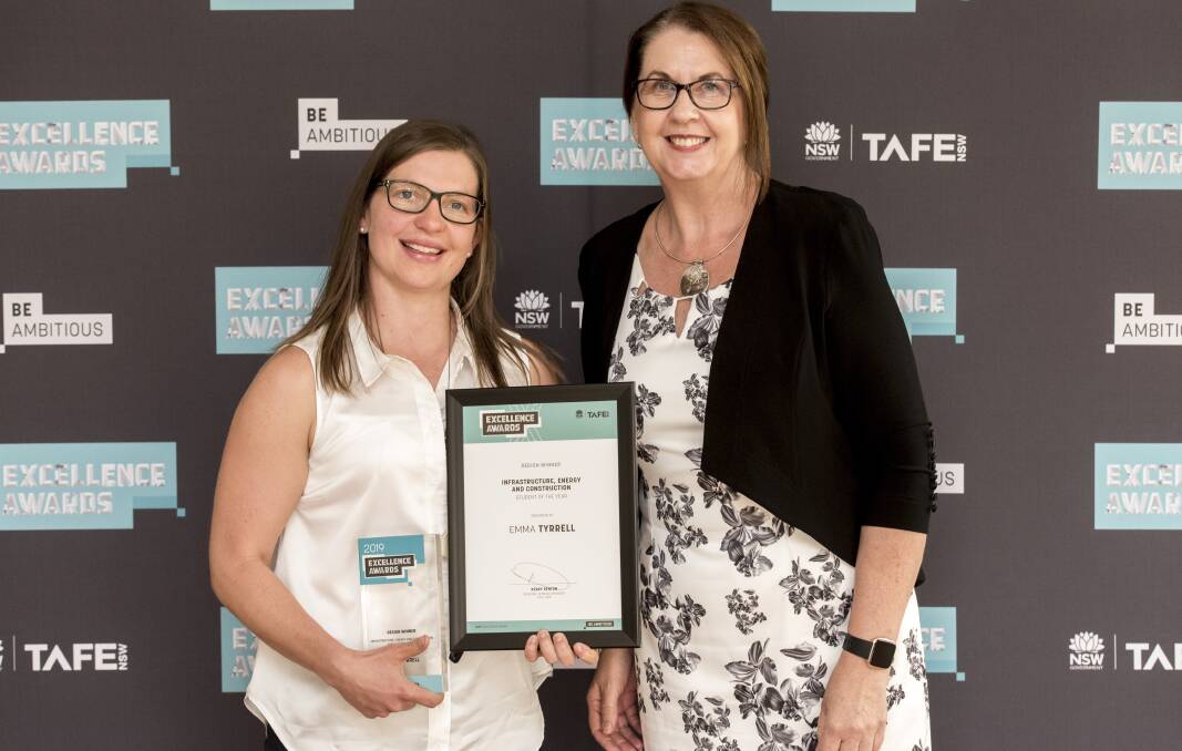 BRIGHT: Leeton's Emma Tyrrell (left) accepts her award from TAFE NSW regional general manager Kerry Penton. Photo: Contributed