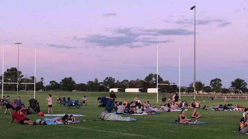 UNDER A TWILIGHT SKY: The evening had two movies play on the big screen at the town ovals recently. 